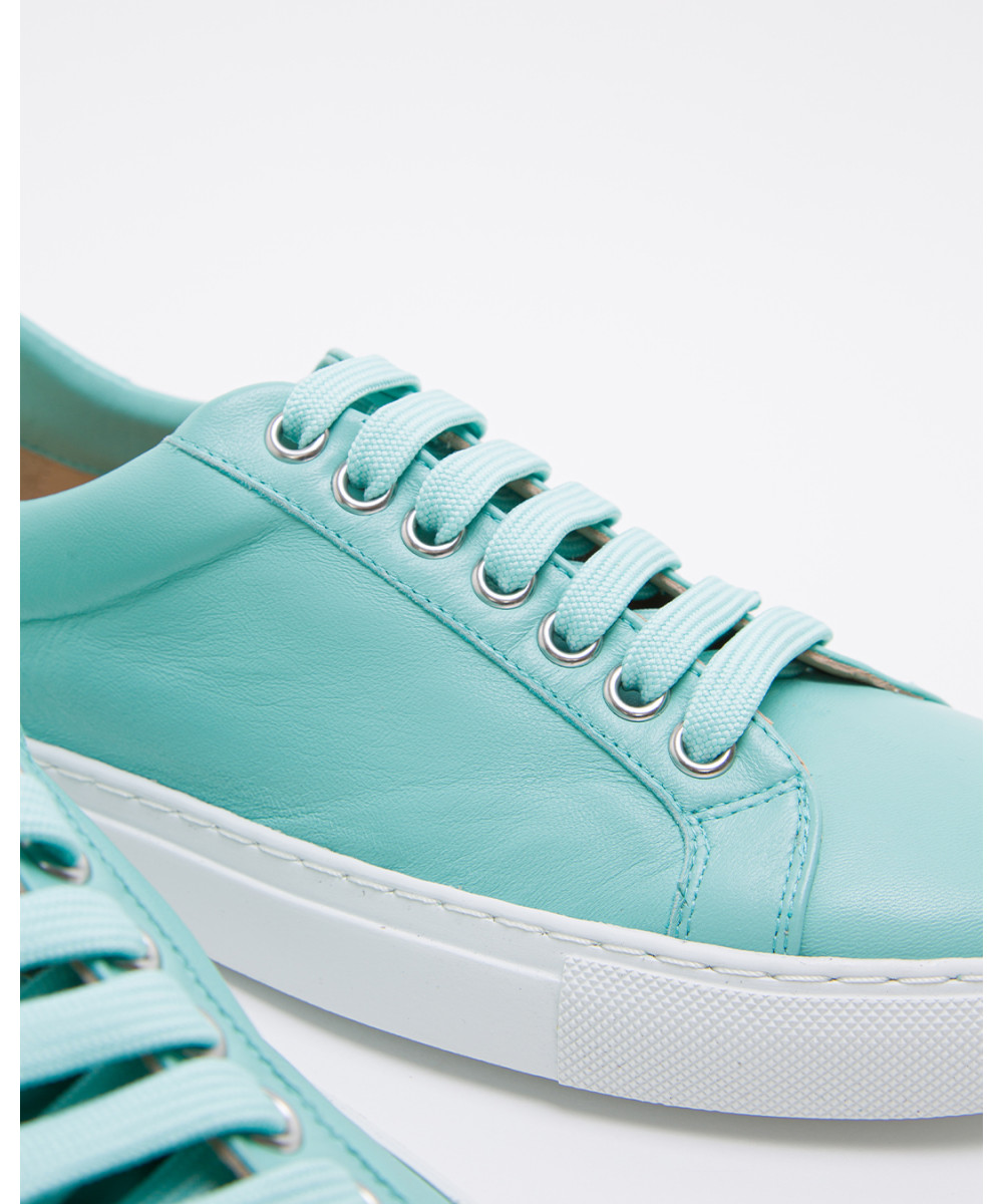 turquoise and white sneakers