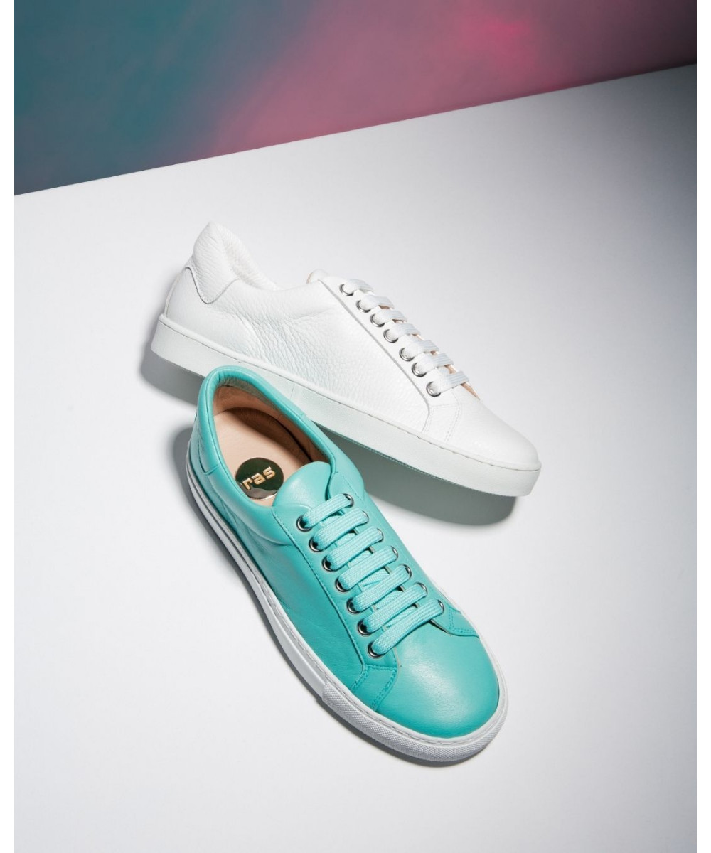 turquoise and white sneakers