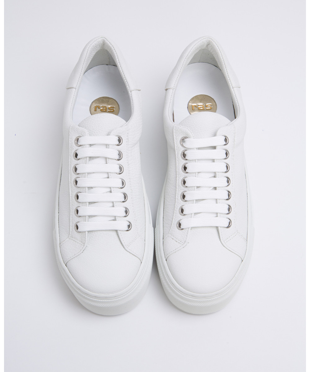 white sneakers with brown platform